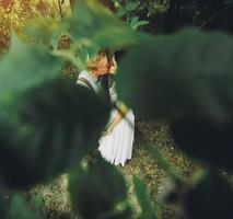 Beautiful wedding couple posing photo