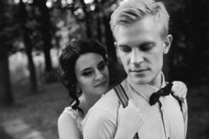 Beautiful wedding couple posing photo