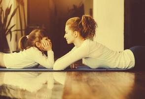 Mother and daughter have fun in the gym photo