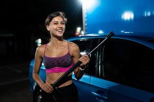 Preparing for car cleaning in a car wash. High Pressure Car Washing. photo