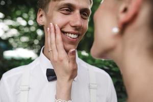 Bride and groom in the forest photo