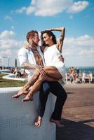 Girl and handsome guy outdoors photo