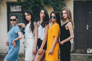 Five beautiful young girls in dresses photo