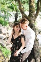 A pair of lovers posing on the camera. photo