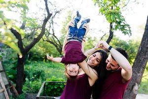 young family with a child on the nature photo