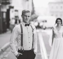 bride and groom on the street photo