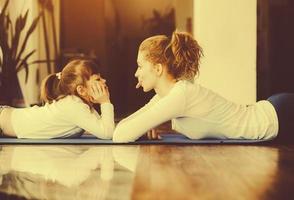 Mother and daughter have fun in the gym photo