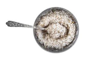 silver salt cellar with spoon with seasoned salt photo
