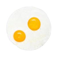 top view of two fried eggs isolated on white photo