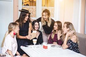 Six girls at the table photo