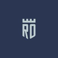 RO logo monogram with fortress castle and shield style design vector