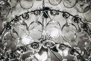 Beautiful chandelier made with glasses of wine photo