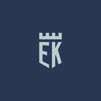 monograma del logotipo ek con castillo fortaleza y diseño de estilo escudo vector