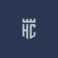 monograma del logotipo de hc con castillo de fortaleza y diseño de estilo de escudo vector