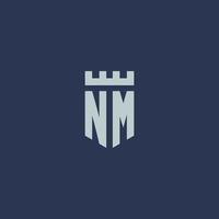 monograma del logotipo de nm con castillo de fortaleza y diseño de estilo escudo vector