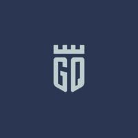 monograma del logotipo gq con castillo fortaleza y diseño de estilo escudo vector
