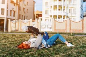 Mother and son on the grass photo