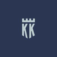 monograma del logotipo kk con castillo de fortaleza y diseño de estilo escudo vector