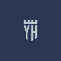 YH logo monogram with fortress castle and shield style design vector