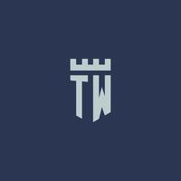 monograma del logotipo tw con castillo de fortaleza y diseño de estilo escudo vector