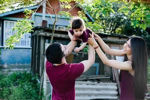 young family with a child on the nature photo