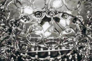 Beautiful chandelier made with glasses of wine photo