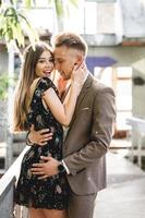 Young couple in love posing on camera photo