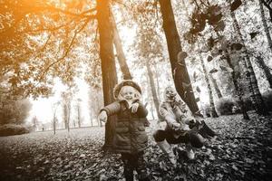 Mother with daughter in autumn park photo