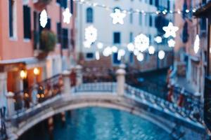 Gondolas on lateral narrow Canal, Venice, Italy. photo