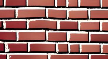 Brown brick wall texture grunge background with vignetted corners of interior photo