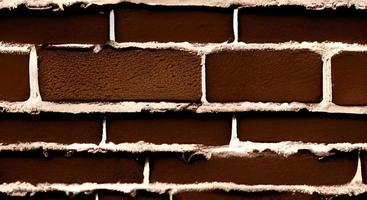 Brick wall with brown brick, brown brick background. photo