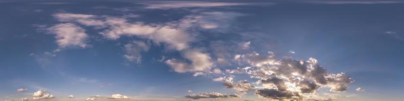 evening blue sky hdr 360 panorama with white beautiful clouds in seamless projection with zenith for use in 3d graphics or game development as sky dome or edit drone shot for sky replacement photo