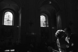 bride and groom illuminated by light photo