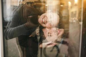 Vintage couple . Girl kiss her boyfriend from above  .Coffee shop photo