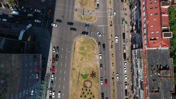 Aerial view of vehicles making U turn in multilane traffic video