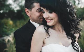 Lovely couple spends time in the field photo