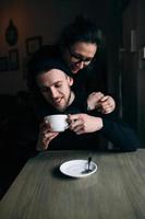 young man and woman posing indoors photo