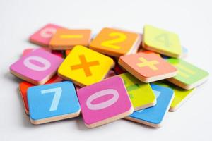 Number wood block cubes for learning Mathematic, education math concept. photo