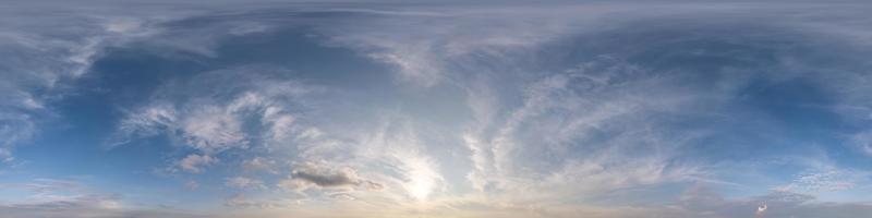 blue sky hdri 360 panorama with halo and white beautiful clouds in seamless panorama with zenith for use in 3d graphics or game development as sky dome or edit drone shot for sky replacement photo