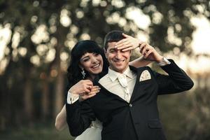 Lovely couple spends time in the field photo