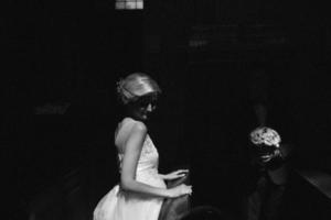 bride and groom illuminated by light photo