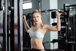 Athletic woman at the gym photo