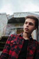 man stand in an abandoned building photo