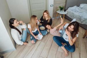 girls on the floor have fun photo