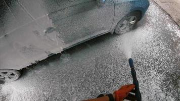Car washing with pressure water hose video