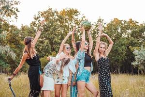 Six girls in nature have fun photo