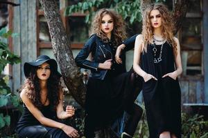 three vintage women as witches photo