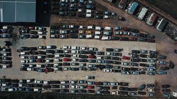 Aerial view of dump with vehicles in neat rows video