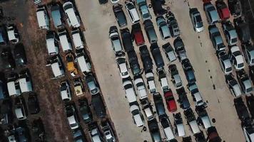 Aerial view of dump with vehicles in neat rows