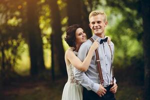 Beautiful wedding couple posing photo